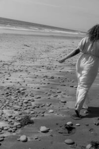 Crosby Noricks walking along the beach